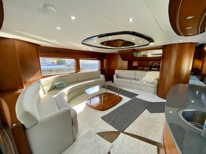 Yacht Photos Pics Luxurious interior of 2007 Rodriquez 80 Widebody yacht with elegant seating and modern design.