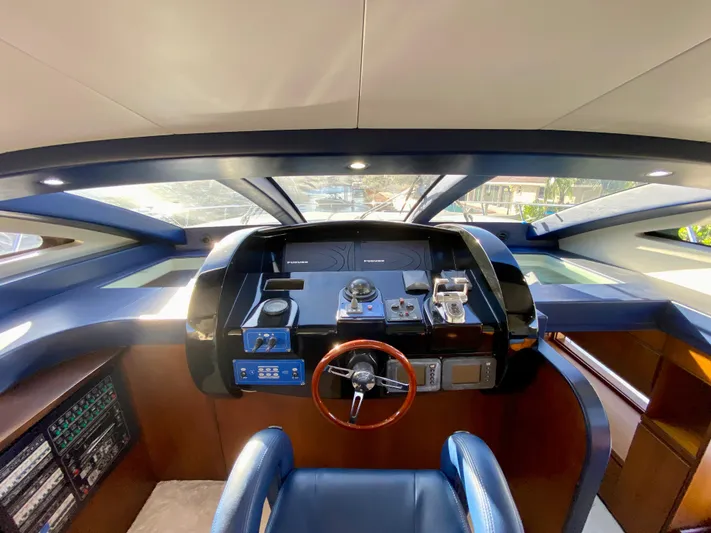  Yacht Photos Pics Luxurious helm of 2007 Rodriquez 80 Widebody yacht with modern controls and panoramic windows.