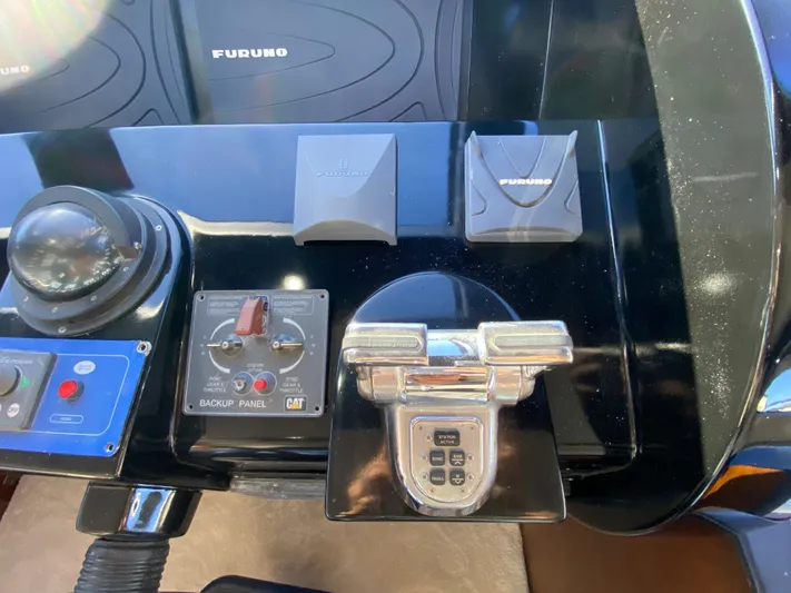  Yacht Photos Pics Control panel of a 2007 Rodriquez 80 Widebody yacht with navigation equipment.