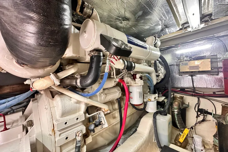 Lanakilla Yacht Photos Pics Engine room of 2005 Sea Ray 420 Sedan Bridge with visible components and wiring.