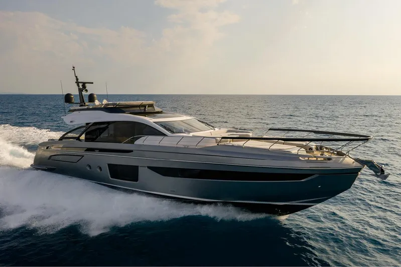  Yacht Photos Pics Luxurious 2022 Azimut S8 yacht cruising on open sea at sunset.