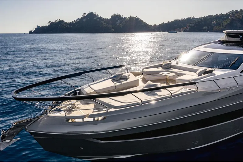  Yacht Photos Pics 2022 Azimut S8 yacht cruising on serene waters with scenic island backdrop.