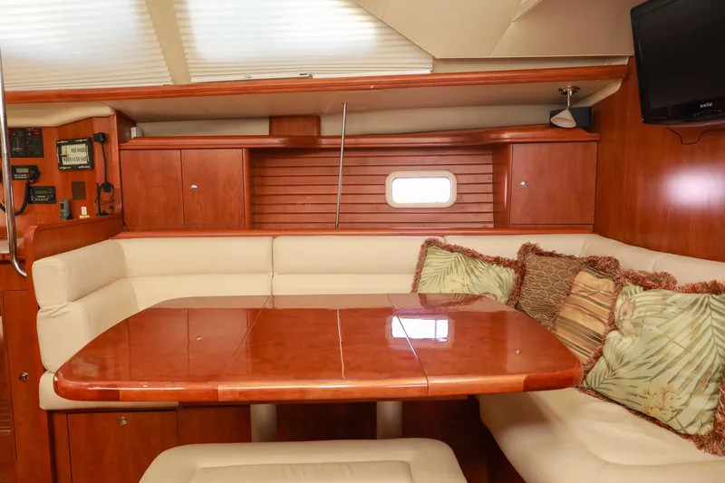 Matt's Dinghy Yacht Photos Pics Luxurious interior of 2009 Hunter 45 Center Cockpit yacht with elegant wood finish.