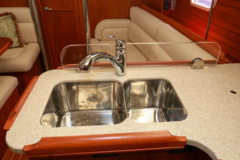 Matt's Dinghy Yacht Photos Pics Luxurious kitchen sink in 2009 Hunter 45 Center Cockpit yacht interior.