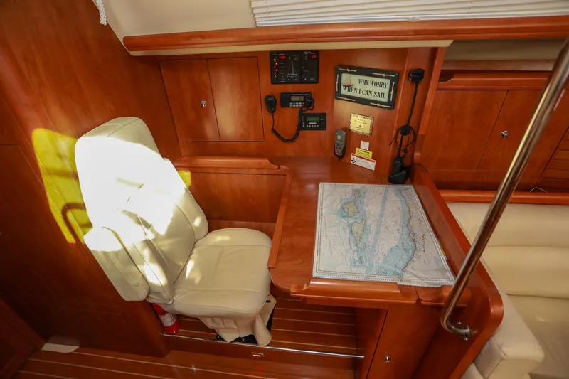 Matt's Dinghy Yacht Photos Pics Interior of 2009 Hunter 45 Center Cockpit with navigation station and map.