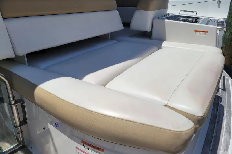 Isabella IV Yacht Photos Pics Luxurious seating on 2012 Four Winns V435 yacht, featuring plush white upholstery.