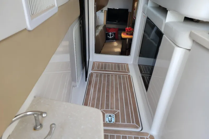 Isabella IV Yacht Photos Pics Interior of 2012 Four Winns V435 yacht with wood flooring and modern amenities.