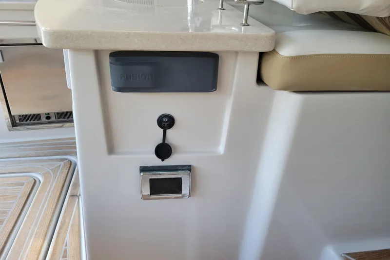 Isabella IV Yacht Photos Pics 2012 Four Winns V435 boat interior with Fusion audio system and seating area.