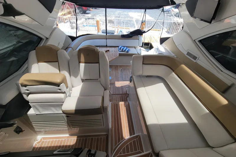 Isabella IV Yacht Photos Pics Luxurious interior of 2012 Four Winns V435 yacht with plush seating and elegant design.