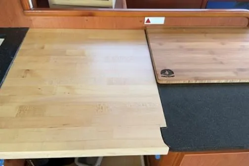 The Light Yacht Photos Pics Wooden countertop in a 2014 Leopard 44 yacht kitchen interior.