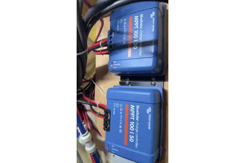 The Light Yacht Photos Pics BlueSolar charge controllers in a Leopard 44, 2014 model, with wiring connections.