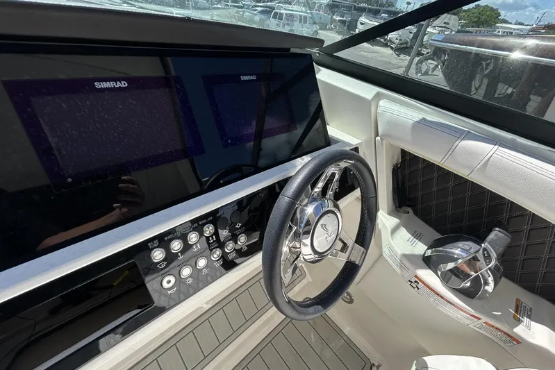  Yacht Photos Pics 2019 Sea Ray SLX 350 Outboard helm with Simrad displays and modern controls.