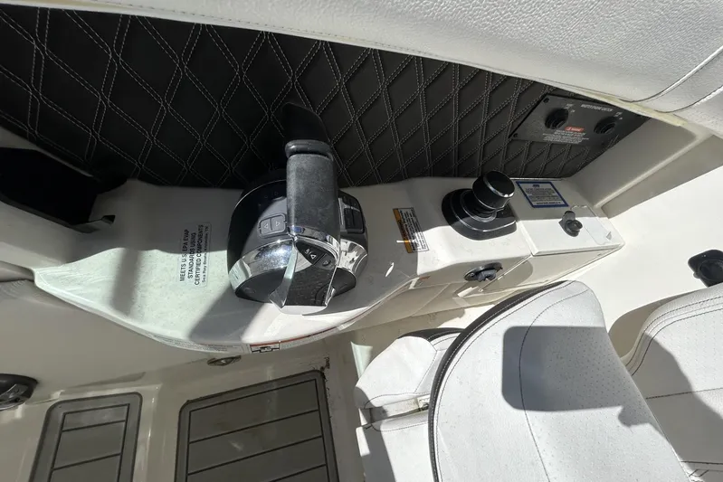  Yacht Photos Pics 2019 Sea Ray SLX 350 Outboard cockpit controls with leather accents and modern design.