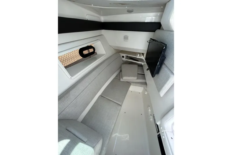  Yacht Photos Pics 2019 Sea Ray SLX 350 Outboard cabin interior with modern seating and window view.