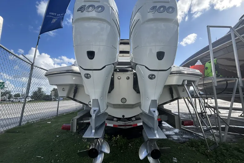  Yacht Photos Pics 2019 Sea Ray SLX 350 Outboard with twin 400 engines, docked outdoors.