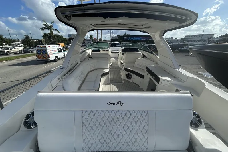  Yacht Photos Pics 2019 Sea Ray SLX 350 Outboard boat with luxurious white seating and spacious deck.