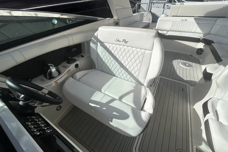  Yacht Photos Pics 2019 Sea Ray SLX 350 Outboard interior with white seating and steering wheel.