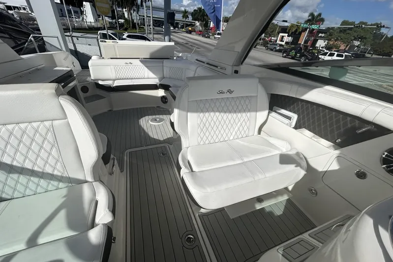  Yacht Photos Pics 2019 Sea Ray SLX 350 Outboard interior with luxurious white seating and modern design.