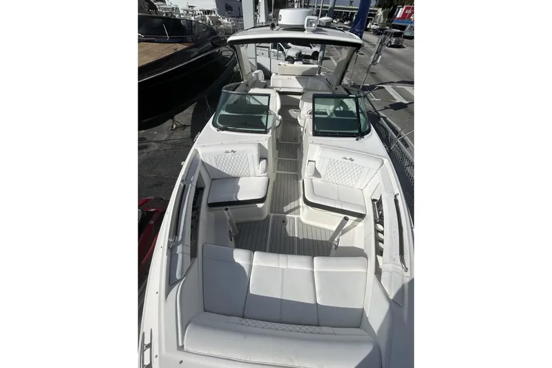  Yacht Photos Pics 2019 Sea Ray SLX 350 Outboard boat with spacious white seating and modern design.