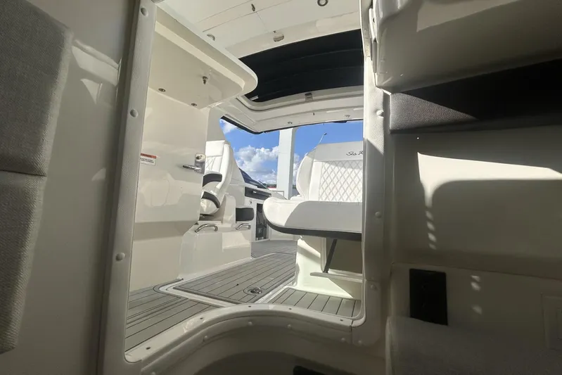  Yacht Photos Pics 2019 Sea Ray SLX 350 Outboard interior with seating and open deck view.