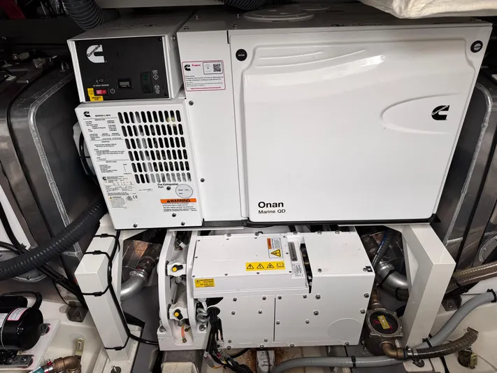  Yacht Photos Pics Engine room of 2023 Prestige 520 F-Line yacht with Onan Marine generator.