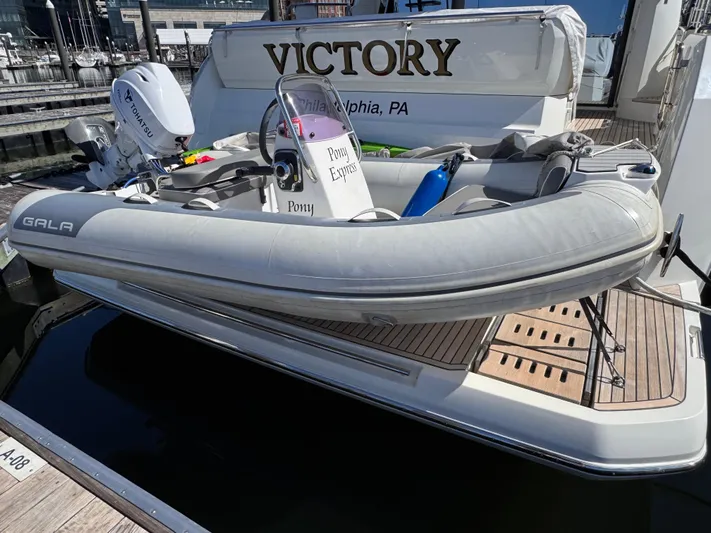  Yacht Photos Pics Prestige 520 F-Line yacht with inflatable boat, docked in Philadelphia, 2023 model.