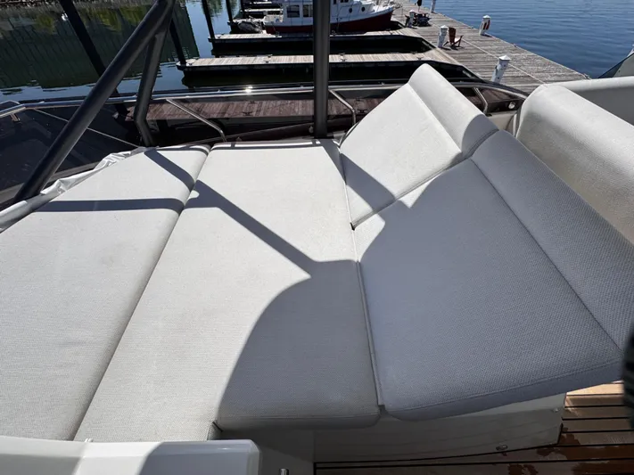  Yacht Photos Pics Prestige 520 F-Line 2023 yacht with spacious sunbathing area on deck.