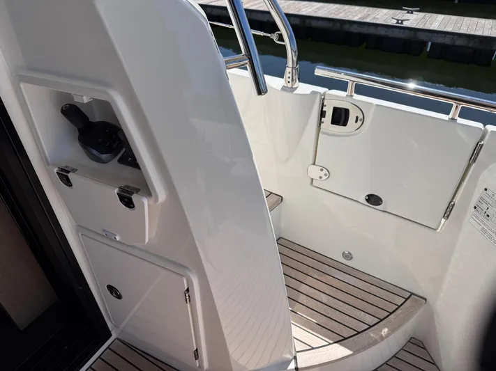  Yacht Photos Pics 2023 Prestige 520 F-Line yacht deck with sleek design and modern features.