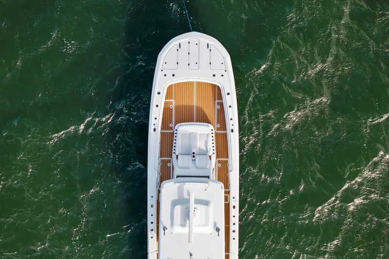  Yacht Photos Pics Aerial view of 2022 Barker Boatworks 40 HPC on green water.