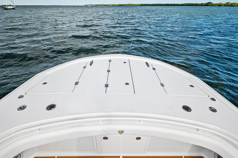  Yacht Photos Pics 2022 Barker Boatworks 40 HPC on open water, showcasing sleek deck design.