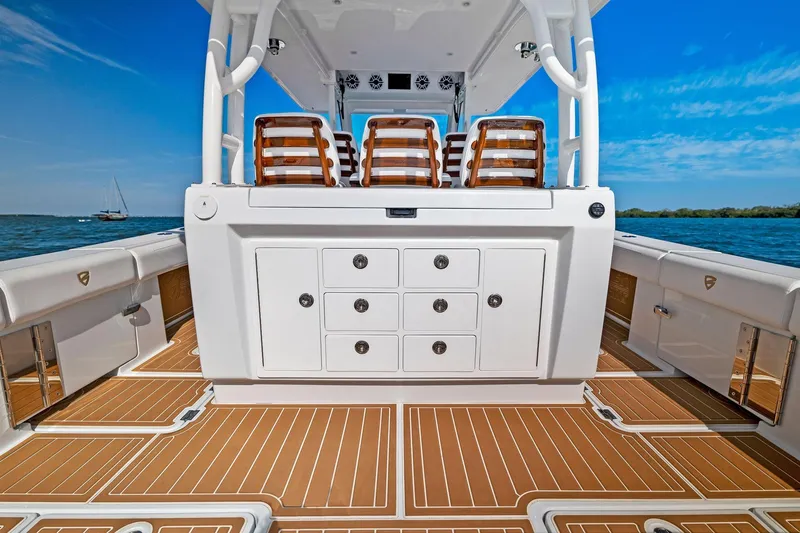  Yacht Photos Pics 2022 Barker Boatworks 40 HPC with teak deck and seating, on open water.