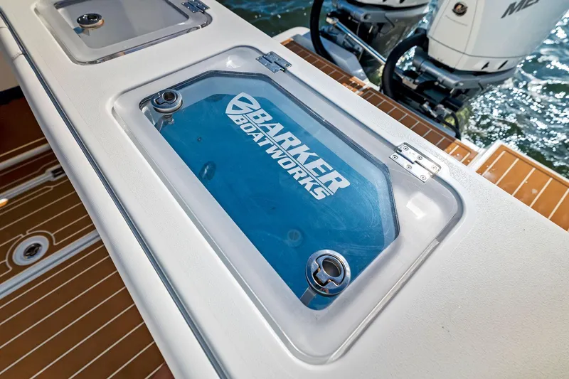  Yacht Photos Pics Barker Boatworks 40 HPC 2022 model with livewell and dual outboard motors on water.