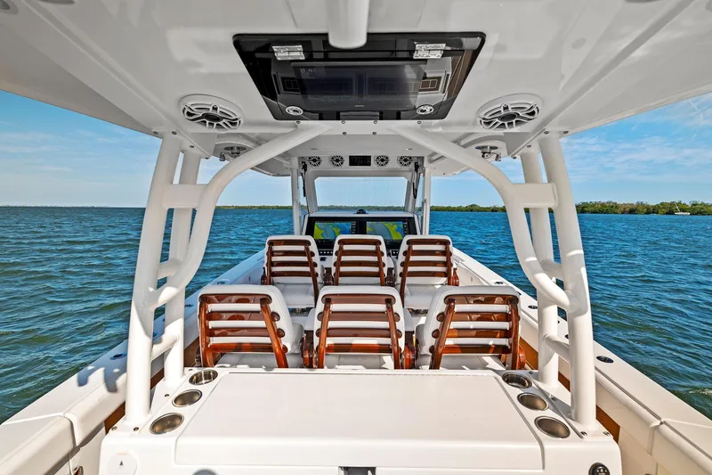  Yacht Photos Pics 2022 Barker Boatworks 40 HPC interior with seating, ocean view, and modern design.