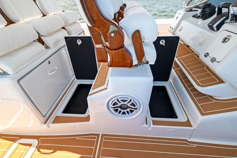  Yacht Photos Pics 2022 Barker Boatworks 40 HPC interior with luxurious seating and storage compartments.