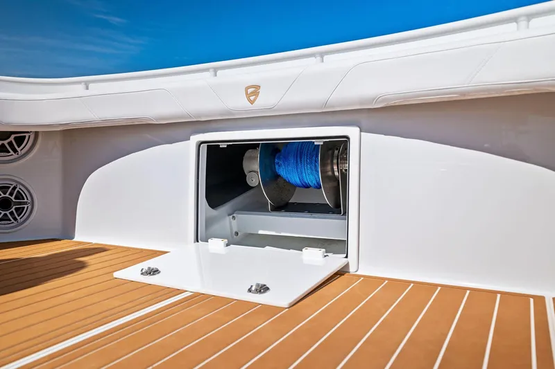  Yacht Photos Pics 2022 Barker Boatworks 40 HPC deck with storage compartment and blue rope.