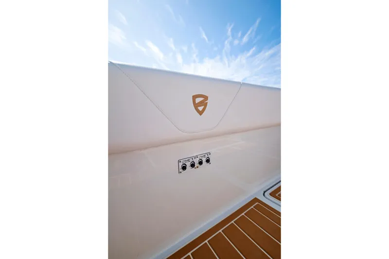  Yacht Photos Pics 2022 Barker Boatworks 40 HPC interior detail with logo and control panel.