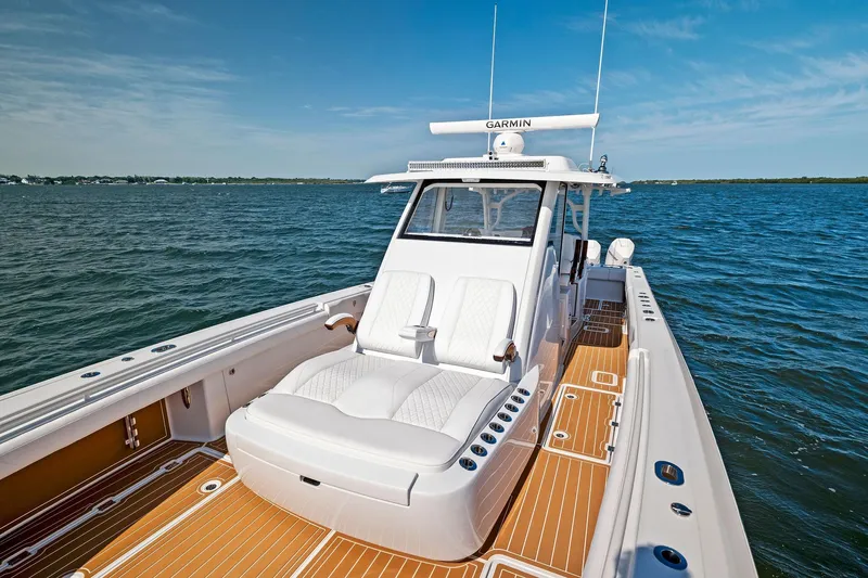  Yacht Photos Pics 2022 Barker Boatworks 40 HPC on water, featuring sleek design and spacious deck.