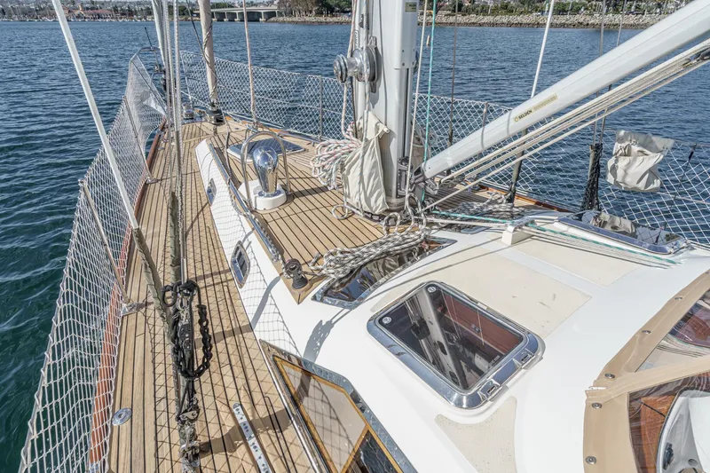 Feather Yacht Photos Pics Deck view of 2012 Hylas 46 sailboat with rigging and netting.