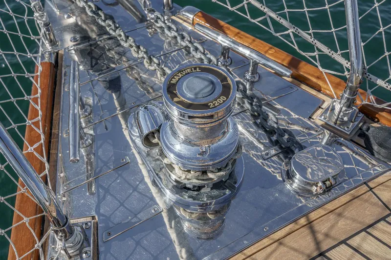 Feather Yacht Photos Pics Close-up of a 2012 Hylas 46 yacht's anchor windlass and chain on deck.