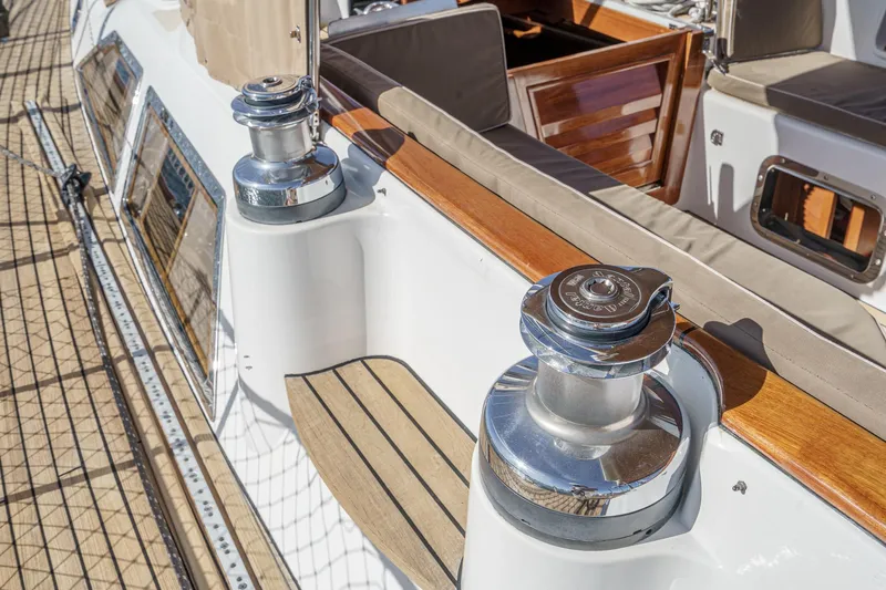 Feather Yacht Photos Pics Hylas 46 sailboat deck with winches and teak accents, 2012 model.