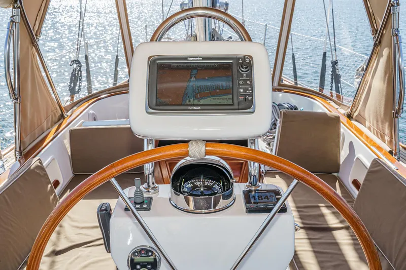 Feather Yacht Photos Pics Hylas 46 yacht cockpit with navigation equipment, 2012 model, overlooking the sea.