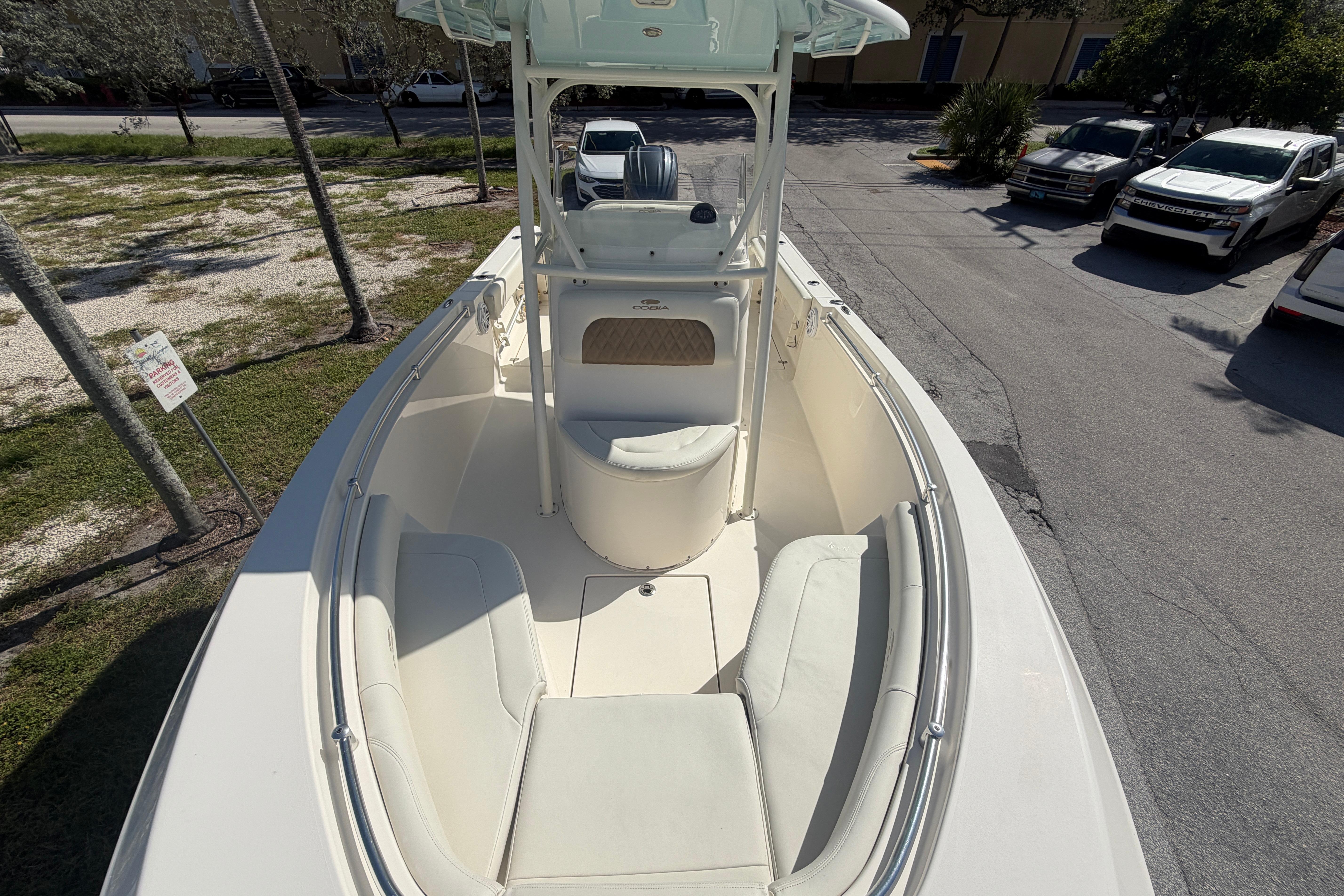 2021 Cobia 237 Center Console boat with spacious seating and sleek design.