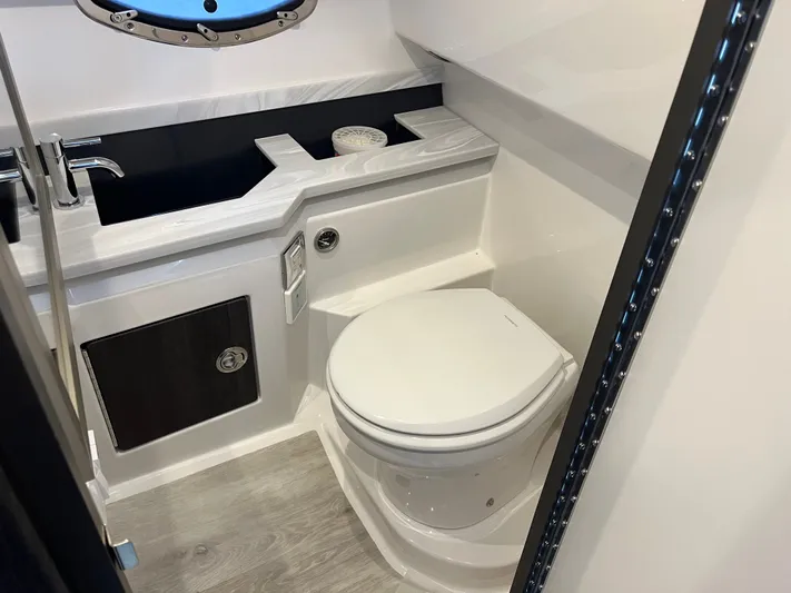  Yacht Photos Pics Interior of 2024 Formula 330 CBR featuring toilet and sink.