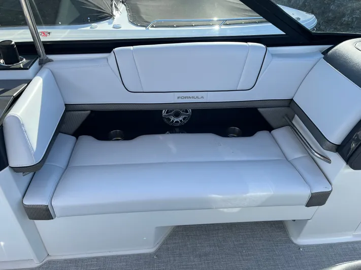  Yacht Photos Pics 2024 Formula 330 CBR boat seating area with white upholstery.