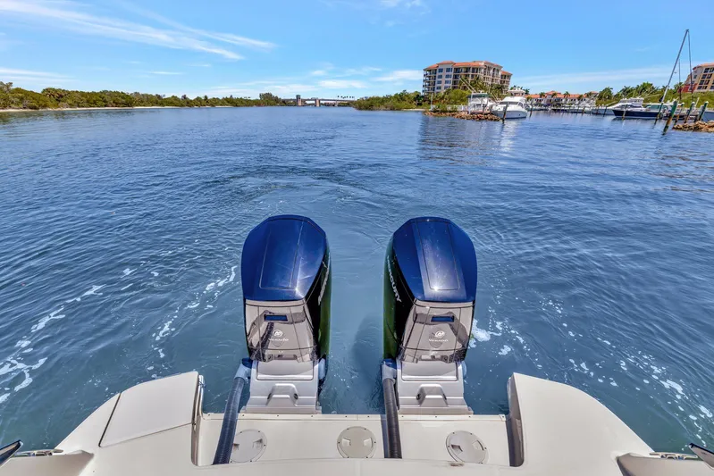  Yacht Photos Pics 2024 Sea Ray Sundancer 370 Outboard cruising on a scenic waterway.