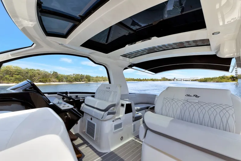  Yacht Photos Pics 2024 Sea Ray Sundancer 370 Outboard interior with luxurious seating and panoramic water views.