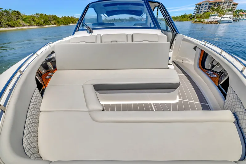  Yacht Photos Pics 2024 Sea Ray Sundancer 370 Outboard interior with luxurious seating and sleek design.