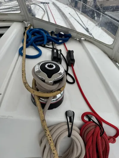 Bel Canto Yacht Photos Pics Winch and ropes on a 2014 Beneteau 37 sailboat deck.