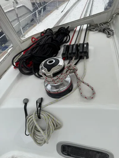 Bel Canto Yacht Photos Pics 2014 Beneteau 37 sailboat deck with winch and ropes.