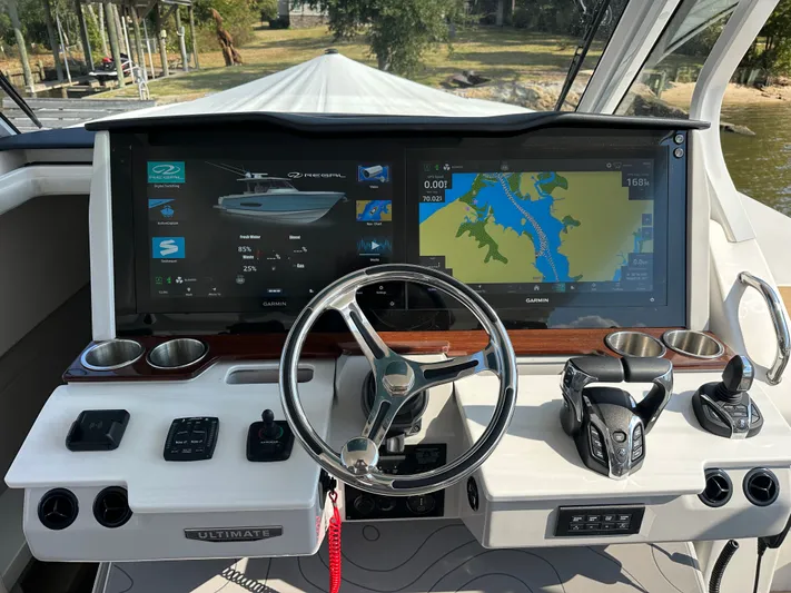  Yacht Photos Pics Helm of 2026 Regal 38 SAV boat with advanced navigation displays and controls.